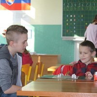 Show_classroom_boys_talking_board_game_a